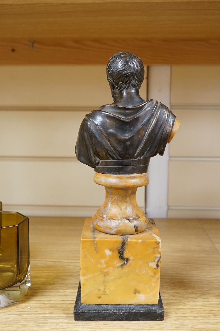 A bronze bust of a philosopher raised on square marble base, 27cm high